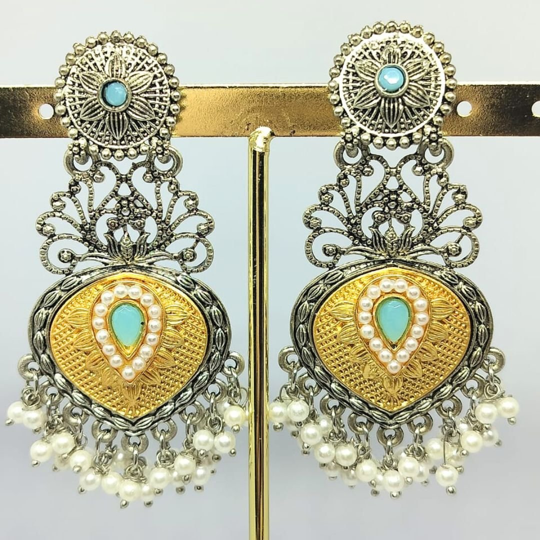 Gold-plated oxidised earrings with turquoise centerpiece, pearl border, and intricate filigree design by Sarvratna Jewellery