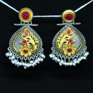Oxidised chandbali earrings with golden floral design, red stones, and pearl drops by Sarvratna Jewel