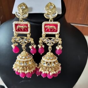 Sabyasachi-inspired kundan jhumka earrings with tiger motif and pink beads by Sarvratna