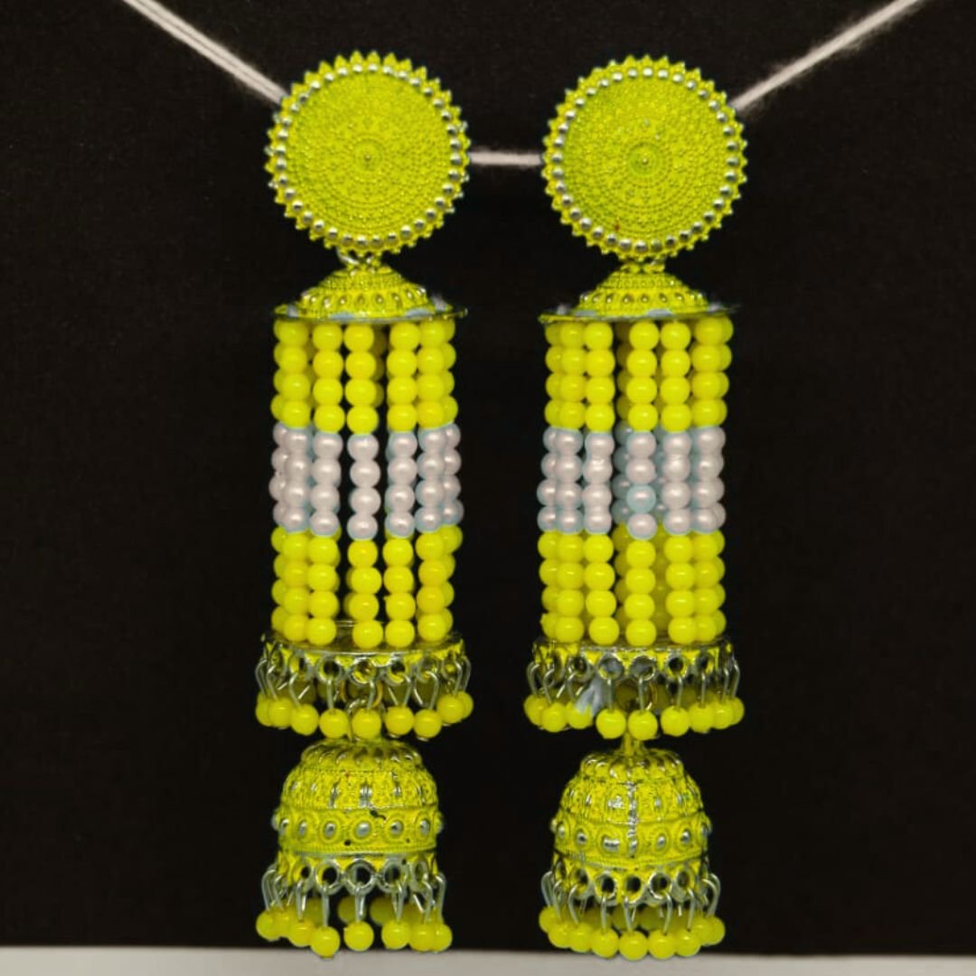 Long yellow and white beaded earrings with jhumka drops from Sarvratna Jewellery, available in multiple colors